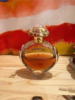 Paco Rabanne Olympea Perfume Bottle - Amber and Gold Accents